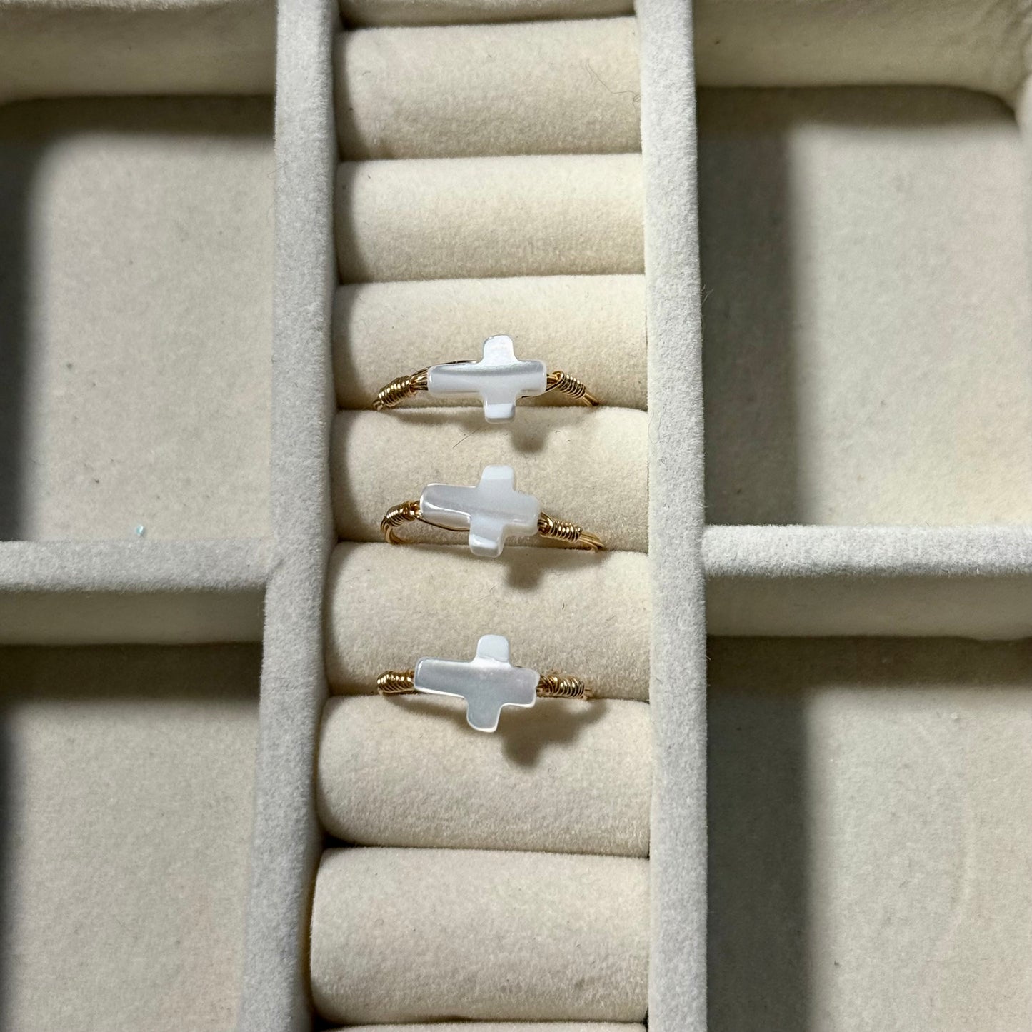 Shell cross ring