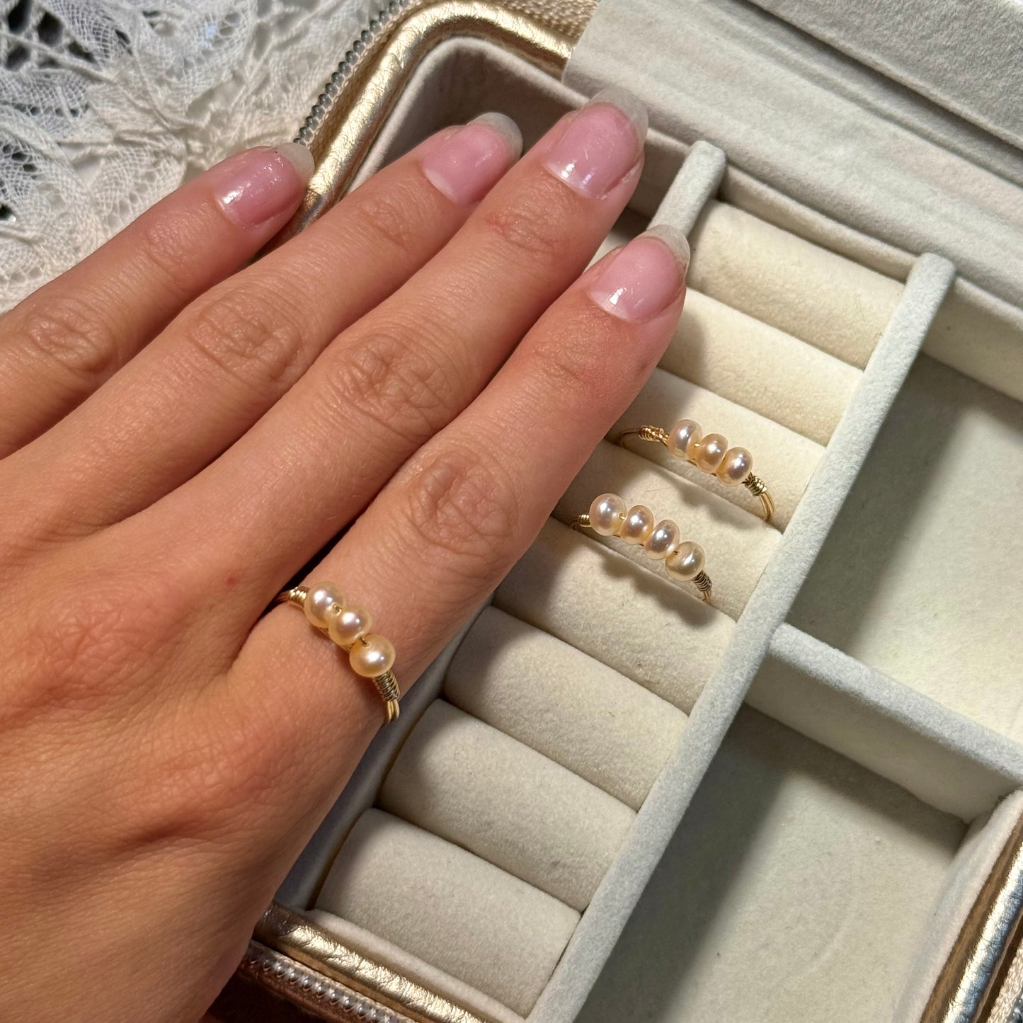 Triple or quadruple pearl ring
