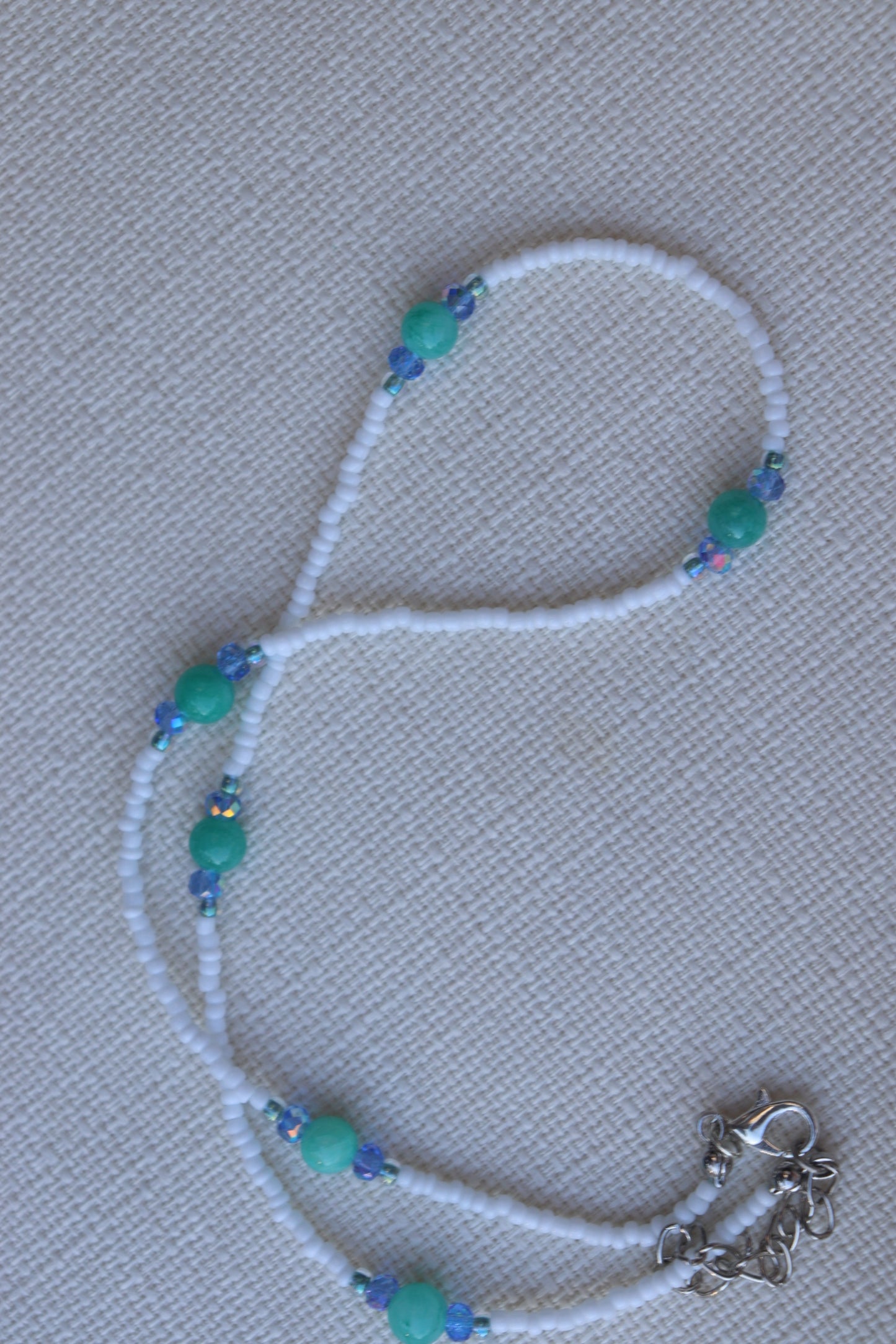 White and teal stones