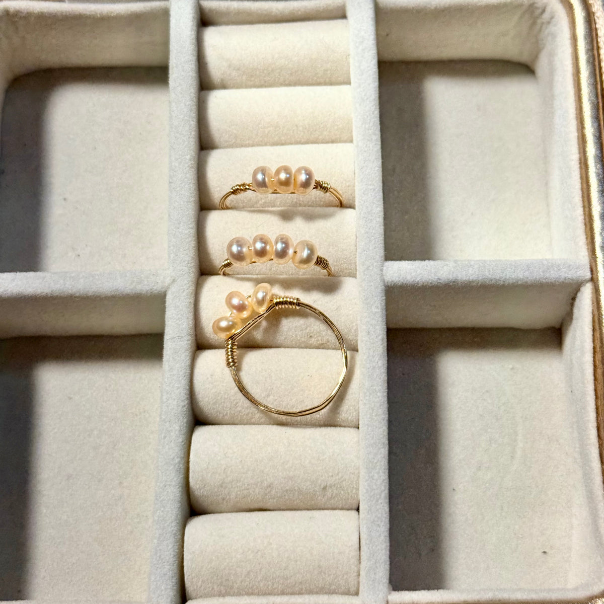 Triple or quadruple pearl ring