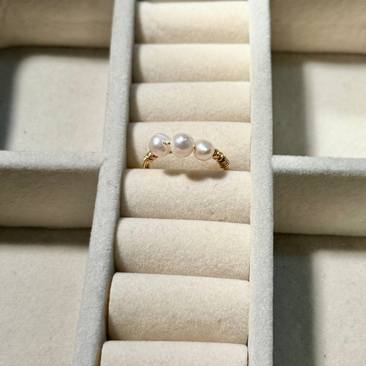 Triple small white pearl ring