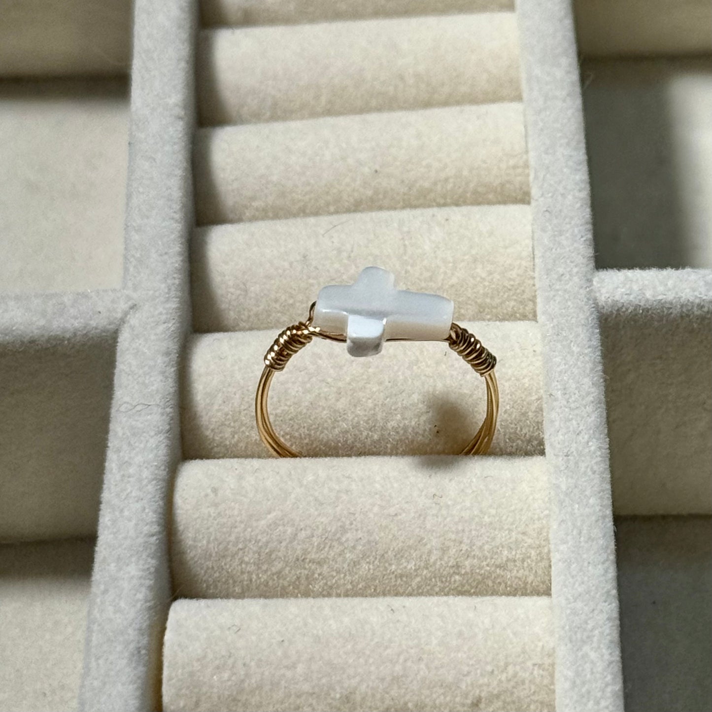 Shell cross ring