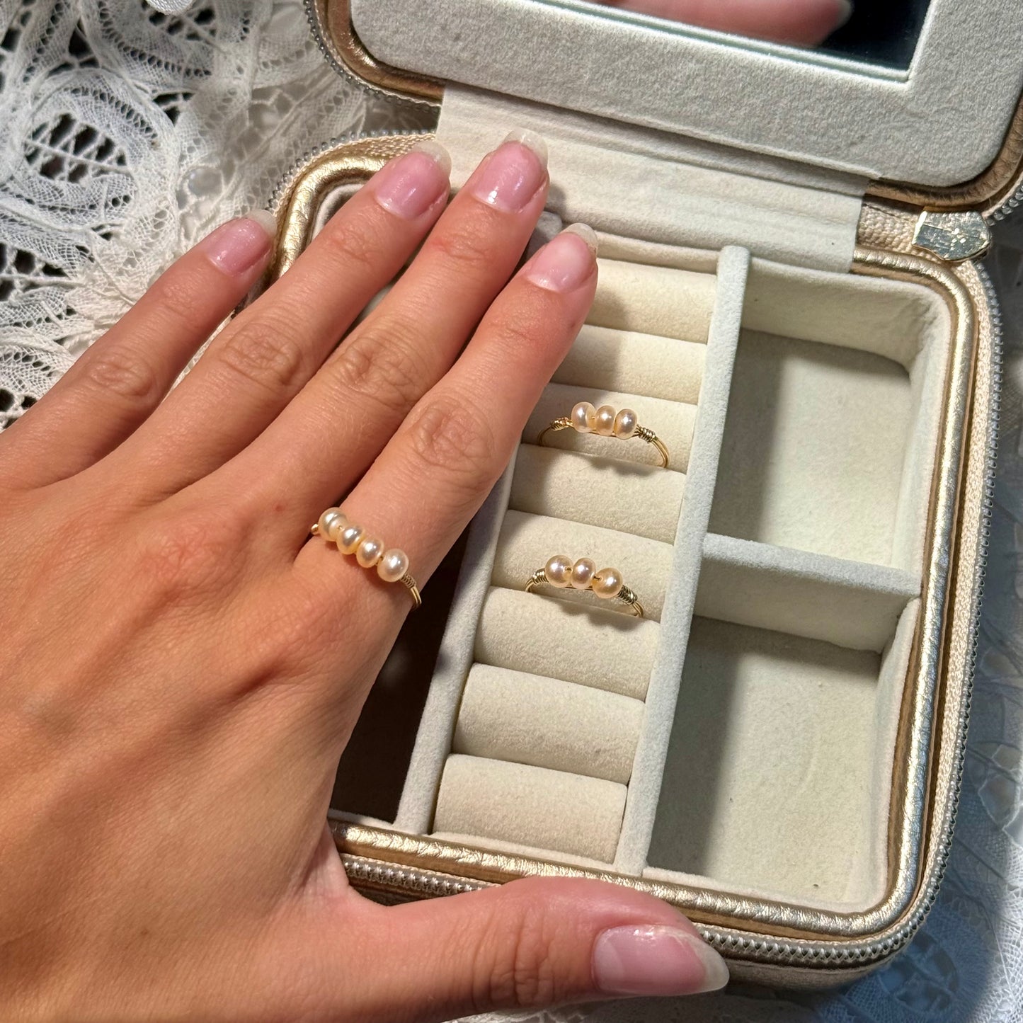 Triple or quadruple pearl ring