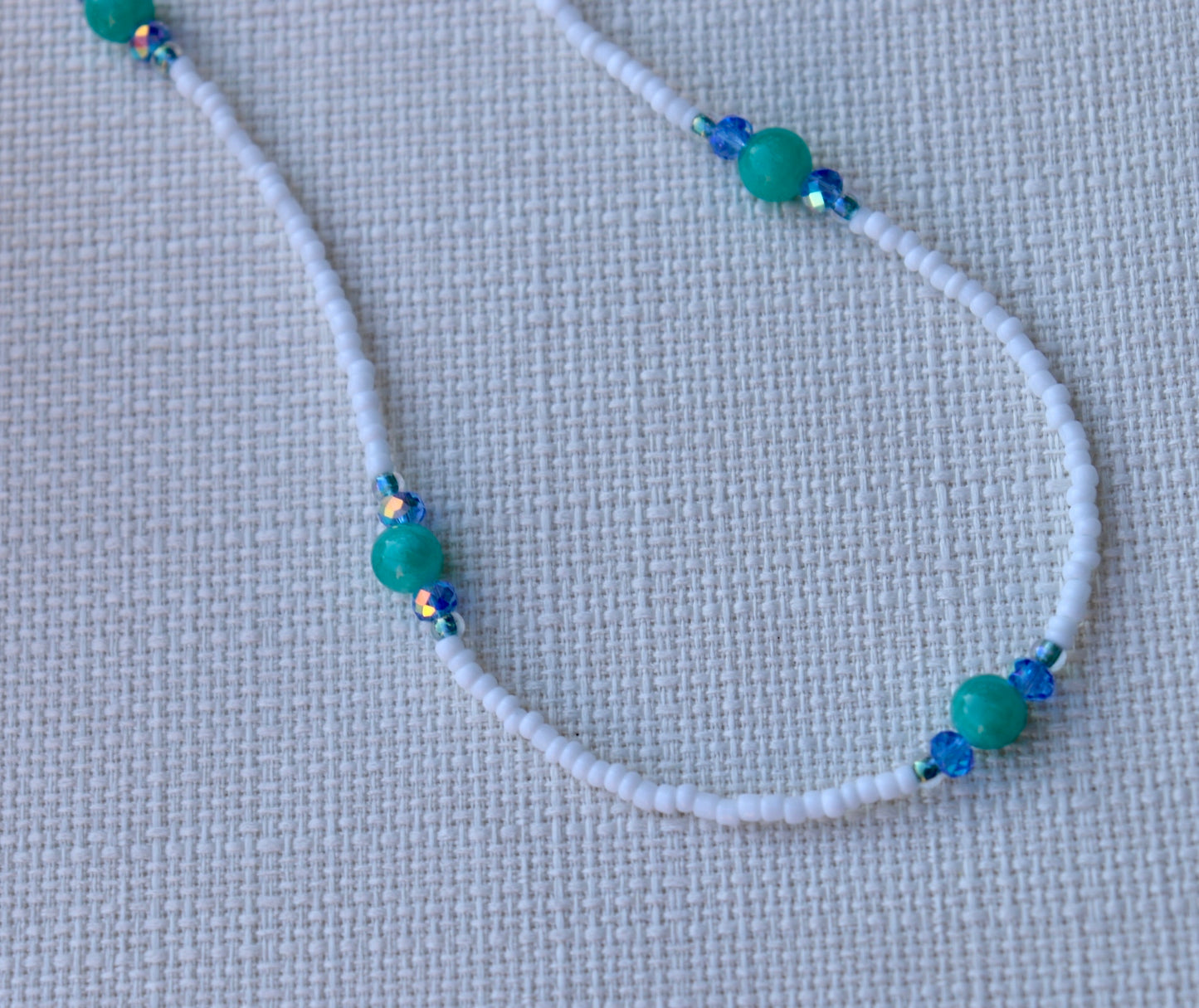 White and teal stones