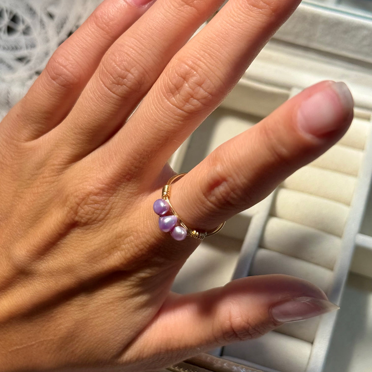 Triple light purple pearl ring