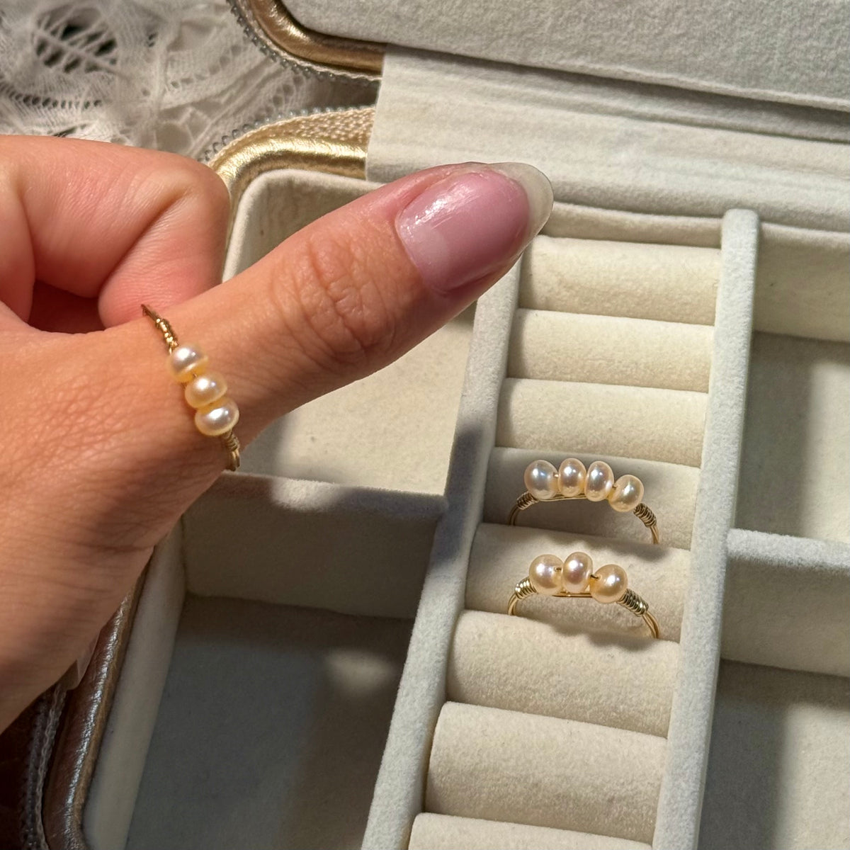 Triple or quadruple pearl ring