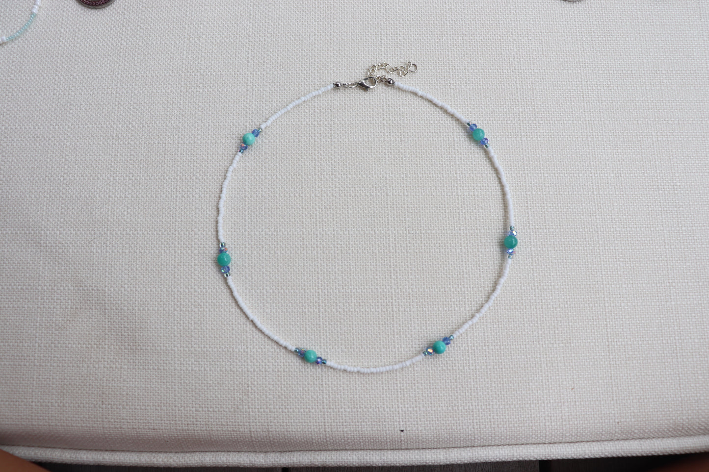 White and teal stones