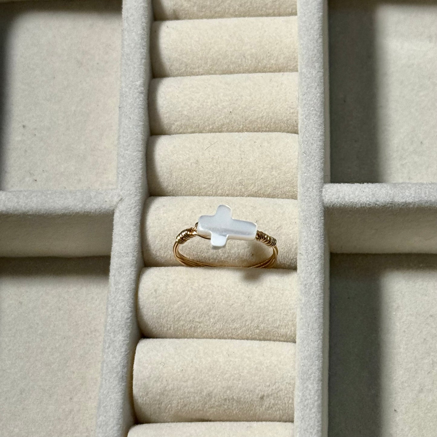 Shell cross ring