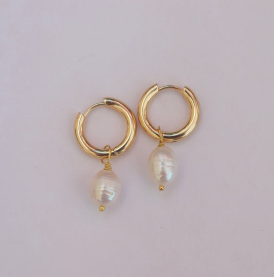 Gold hoop earrings with pearl drops 